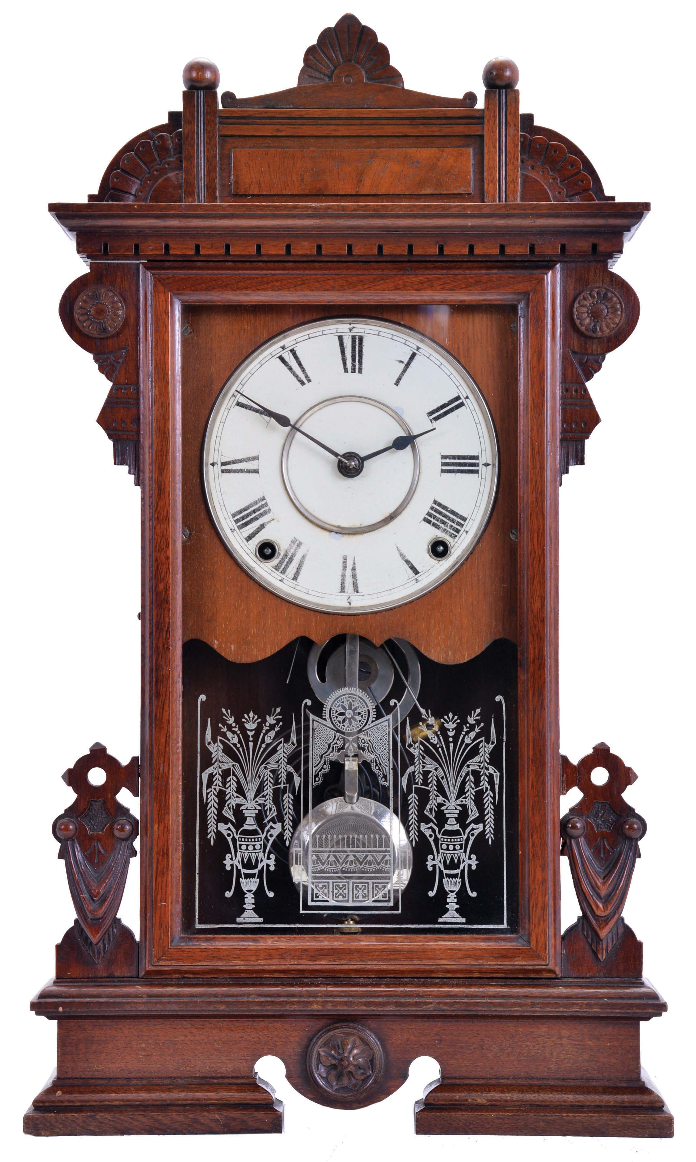Seth Thomas Clock Co., Thomaston, Conn., "Ogden" shelf clock with a spring driven, 8 day, time and strike, lyre movement in a walnut case. — Antique Clocks Price Guide