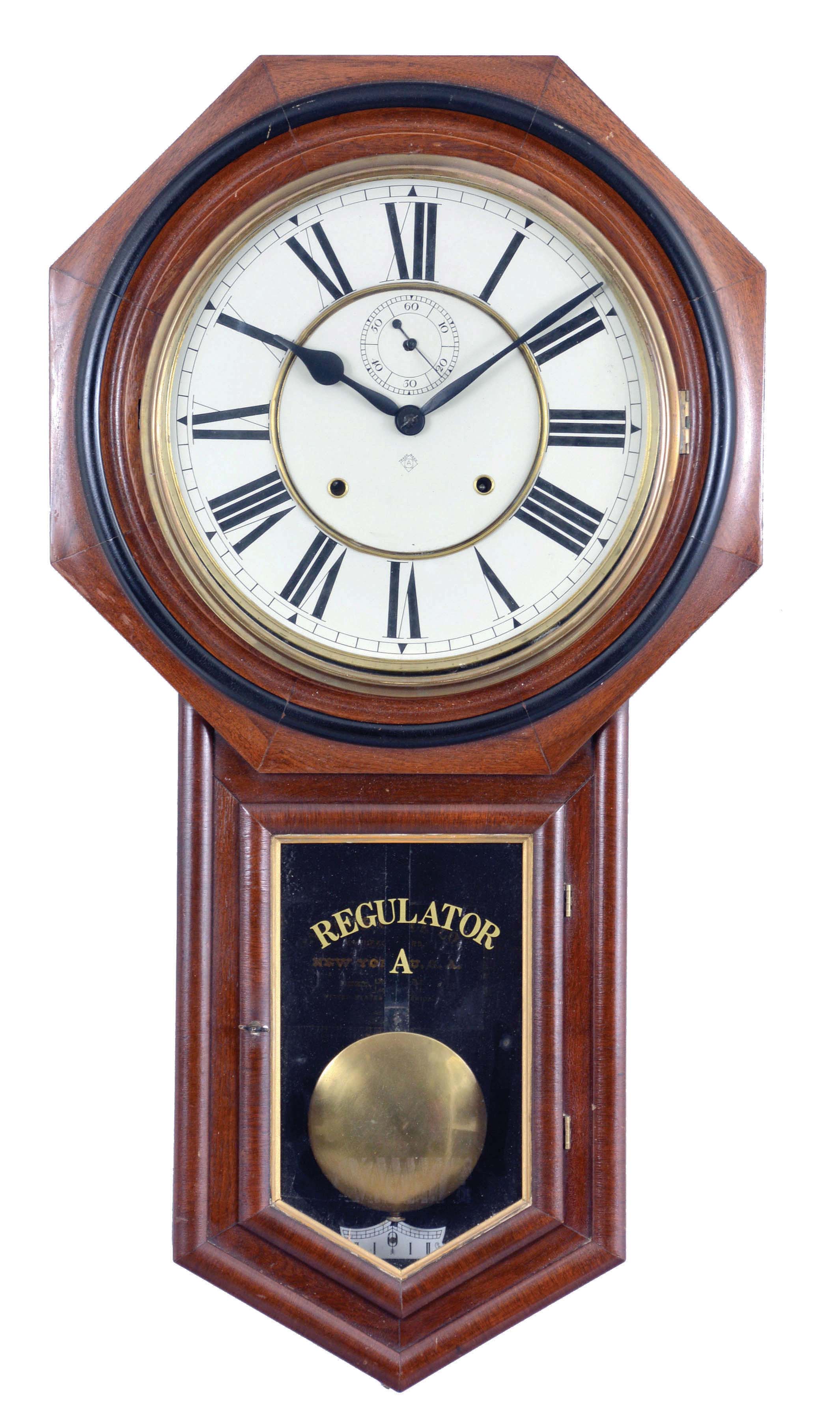 Ansonia Clock Co., New York, NY, "Regulator A" hanging clock with a spring driven, 8 day, time and strike movement in a walnut case. — Antique Clocks Price Guide