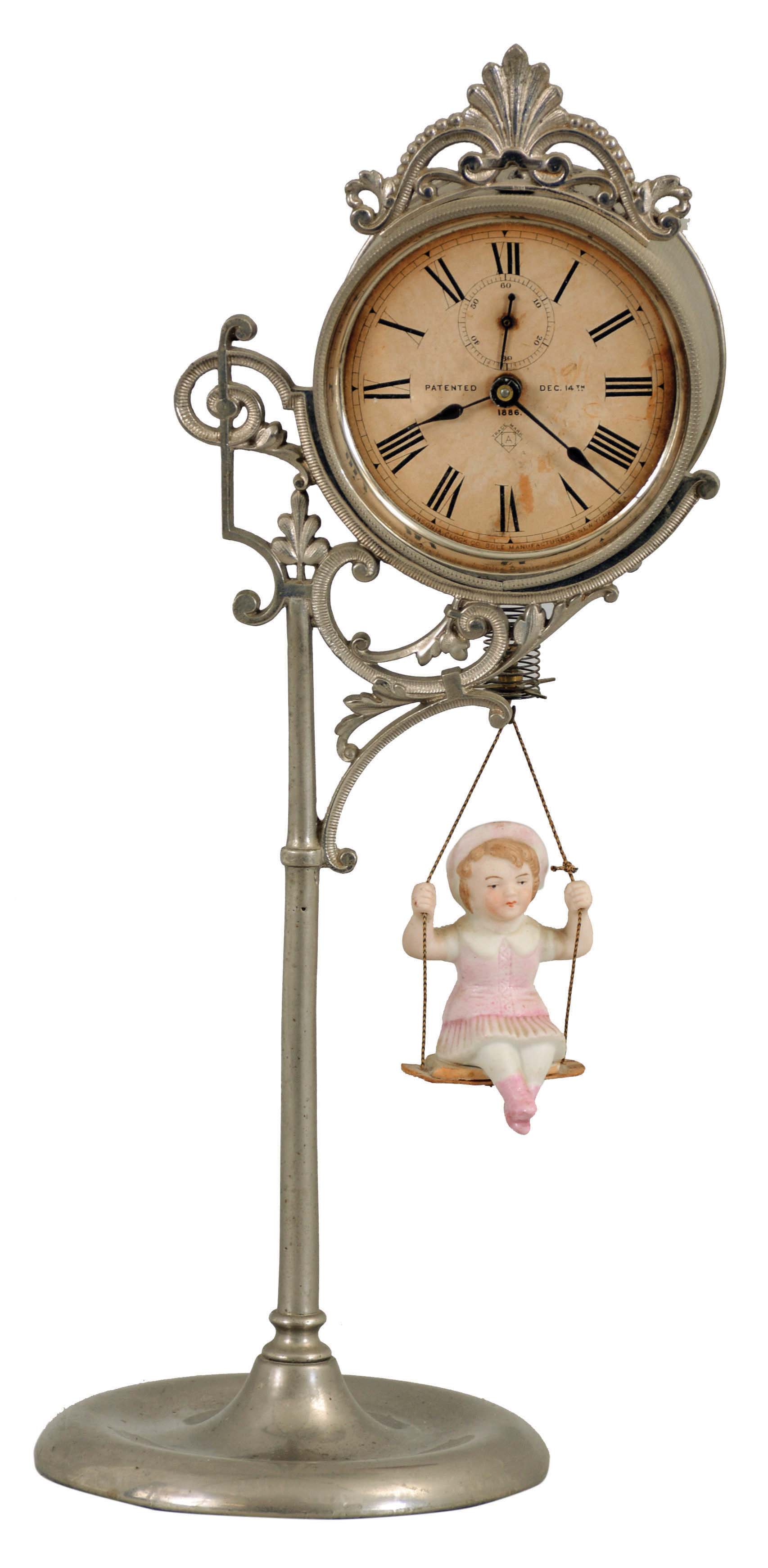 Ansonia Clock Co., New York, NY, "Jumper No. 1" bobbing doll shelf clock with a spring driven one day timepiece movement in a nickel plated case. — Antique Clocks Price Guide