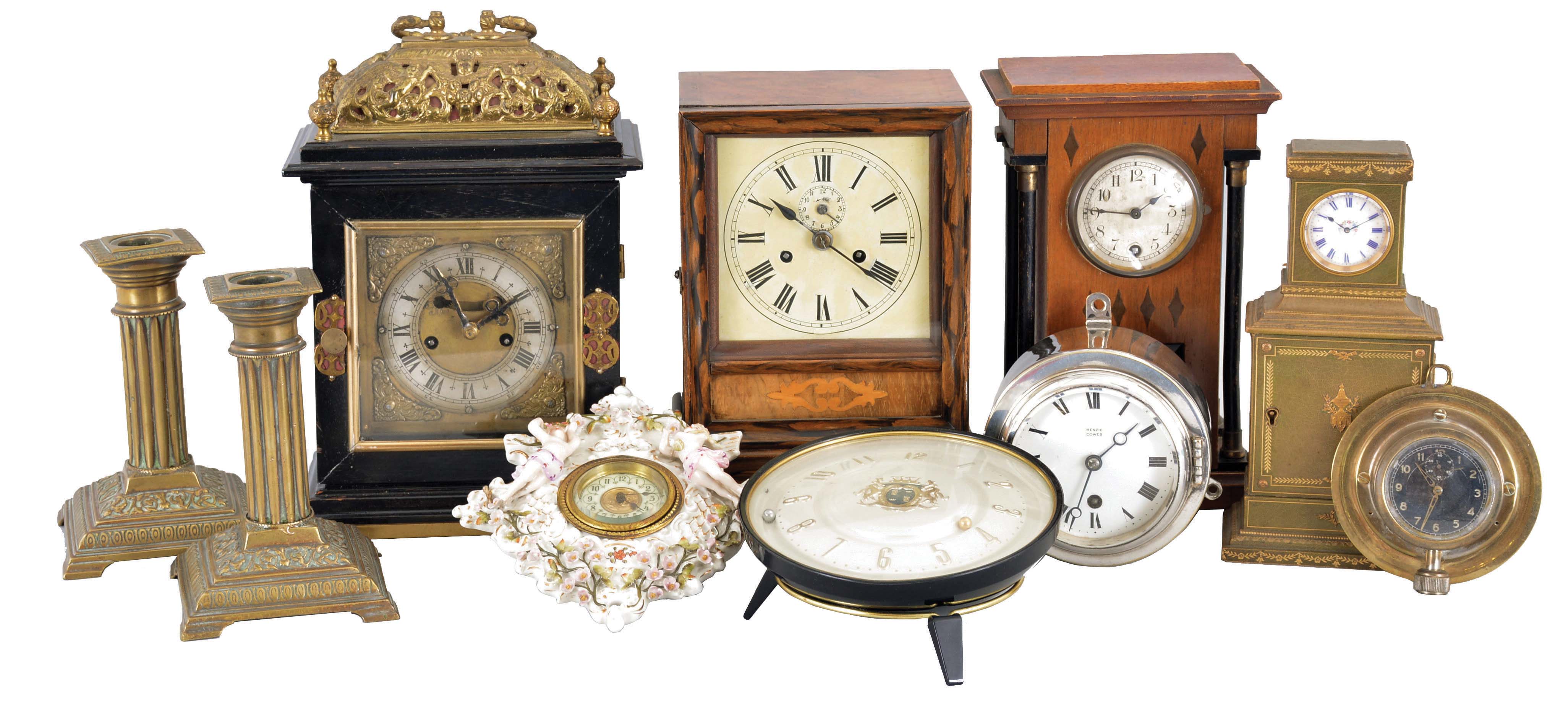 Clocks- 8 (Eight) Mantel &amp; Desk: (1) Austria, bracket clock, 8 day, time and strike in a wood case with brass basket top and silvered chapter ring; (2) Winterhalder &amp; Hofmeier, Germany, mantel clock, 30 hour, time and strike in a walnut case; (3) "Rapid Ralph" novelty clock; (4) Benzie Cowes, England, wall clock in nickel case; (5) Hanging clock, 30 hour, time only in ornate ceramic case; (6) Germany, car clock with a brass mounting plate; (7) Hamburg American Clock Co., Germany, 8 day, time only in wood case; (8) Watch-sized movement in miniature chest of drawers; (9) and (10) brass candlesticks. — Antique Clocks Price Guide