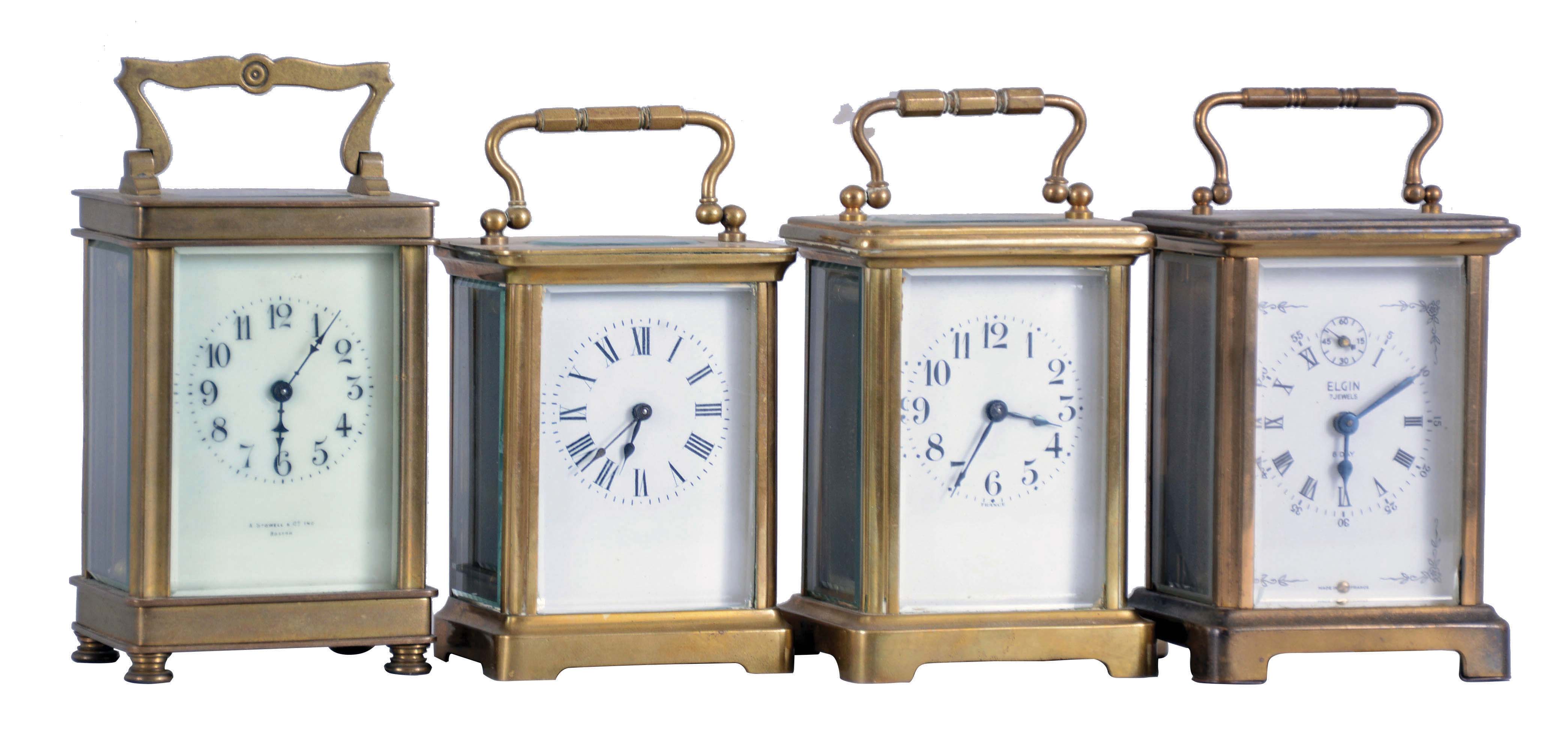 Clocks- 4 (Four) carriage: France, all with glazed brass cases with 8 day timepiece movements, three lever and one cylinder platform, three with white enamel dials and blued steel hands, one marked "John Wanamaker Philadelphia New York Paris", another marked "A. Stowell &amp; Co., Inc., Boston", and one marked Elgin, dimensions of largest clock listed — Antique Clocks Price Guide