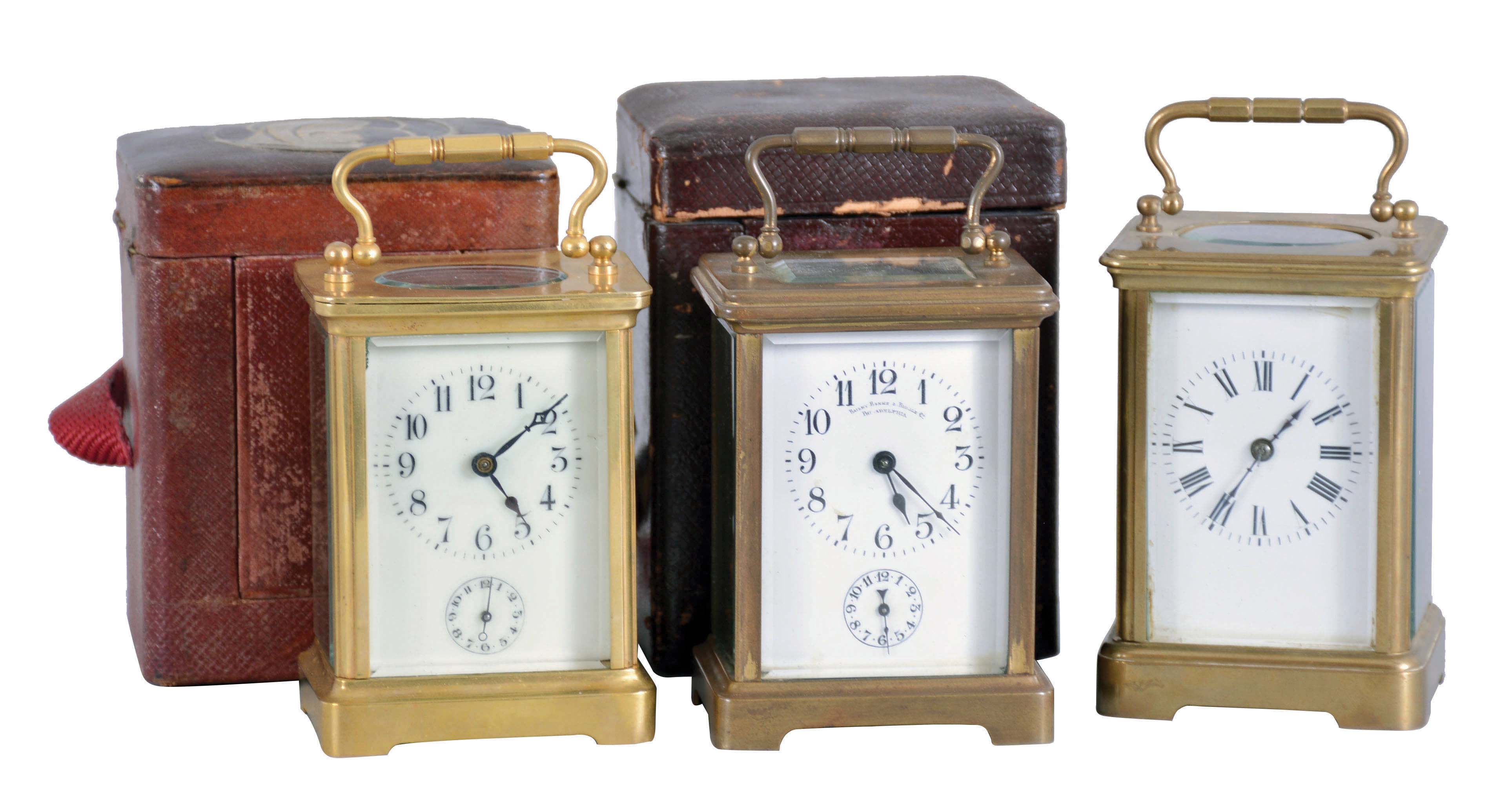 Clocks- 3 (Three) carriage: France, the first with Corniche case, Roman numeral white enamel dial, and 8 day, time and strike movement with lever platform, the others in similar cases, also with enamel dials, and 8 day time and alarm movements with lever platforms, and with their outer cases, striking clock dimensions listed — Antique Clocks Price Guide