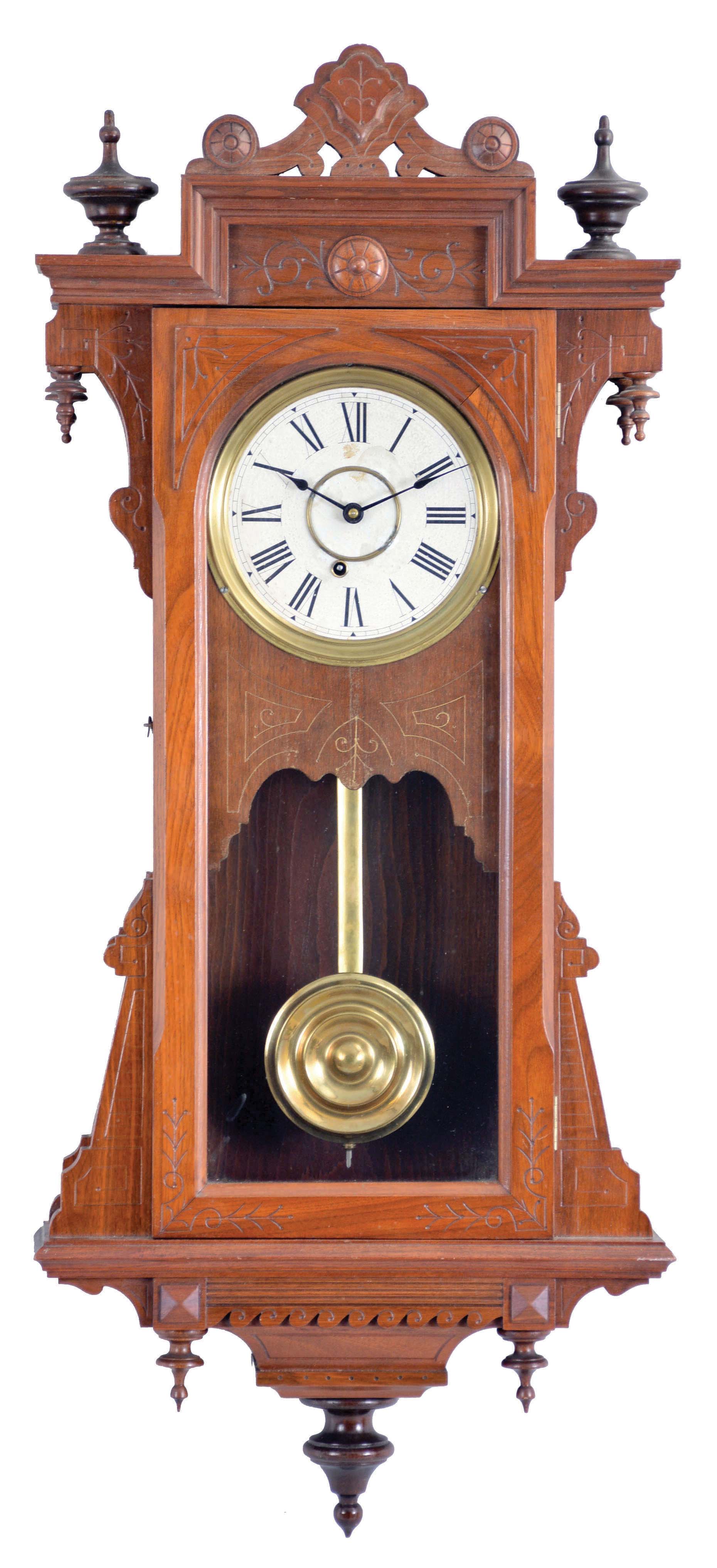 E. Ingraham &amp; Co., Bristol, Conn., "Bartholdi" wall hanging clock with a spring driven, 8 day timepiece movement in a walnut case. — Antique Clocks Price Guide