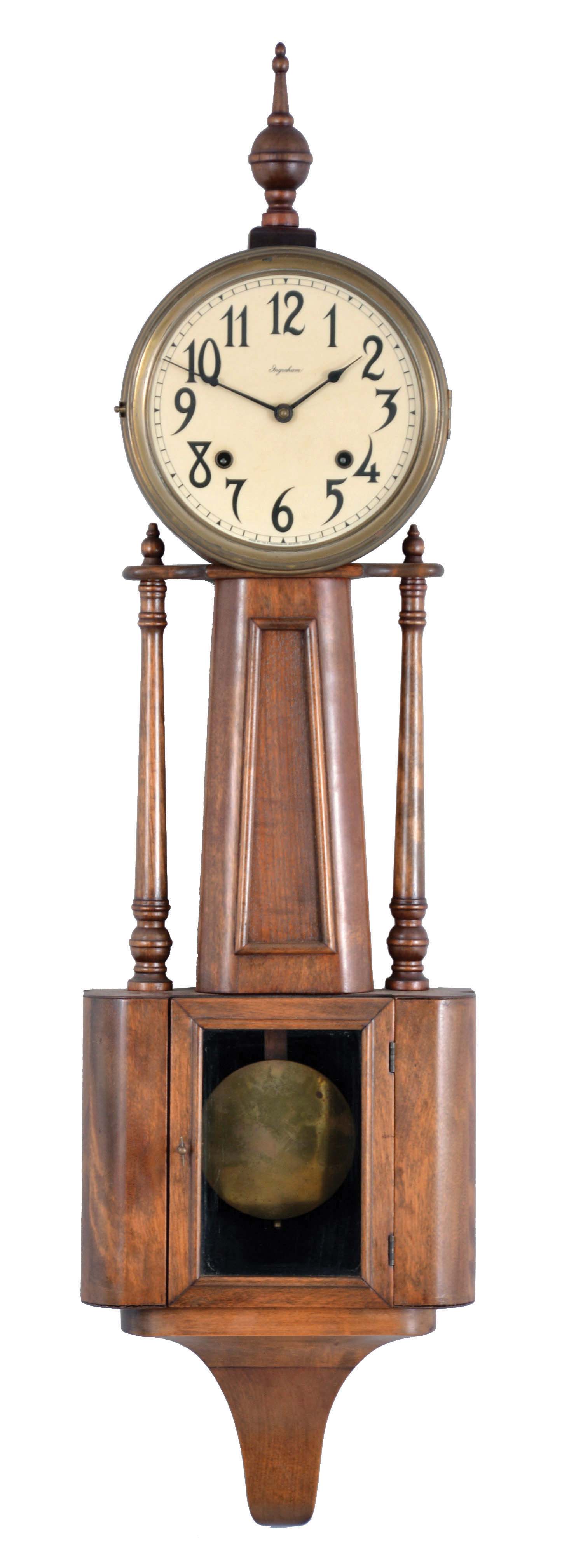E. Ingraham &amp; Co., Bristol, Conn., "Nile" banjo clock with a spring driven, 8 day, time and strike movement in a rubbed mahogany finish case — Antique Clocks Price Guide