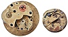 Chronometer movements- 2 (Two), the first an eight day with spotted plates, reverse fusee, Z balance, and helical hairspring, the other a two day, also with Z balance and helical hairspring, together with a chronometer winding key, and a set of gold chronometer hands