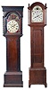 Tall Clocks- 4 (Four) and a tall clock case only: (1) English in a wide Yorkshire, short door case, the hood with mask for a 14" dial, 8 day movement with a 13" dial, c1840; (2) Monitor Clockworks mission style time only in oak; (3) S. Hoadley, Plymouth wooden works 30 hour, c1825; (4) Hutchinson, Douglas, Scottish in mahogany veneer case with Escape of Queen Mary" theme on dial including portraits of several famous Scottish poets, c1830; (5) English case only in walnut, c1850