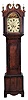 English, 8 day tall clock, time and bell strike, weight driven movement in a mixed veneer/ mahogany inlaid oak case with broken arch top set with brass rosettes and finials, flat reeded pilasters flanking door, painted arch dial with calendar and seconds hand.
