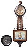 Clocks- 2 (Two) American spring driven wall: (1) Seth Thomas U.S. Navy ship's clock in a phenolic case; (2) E. Ingraham "Yankee Clipper" banjo