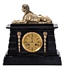 Jean-Baptiste Delettrez (J.B.D.), Paris, for W.C. Shaw, Glasgow, mantel clock, 8 day, time and strike, spring driven movement with unusual key setting arbor in the lower front of the dial, black slate Egyptian revival case with gilt dial and accents, the whole surmounted by a gilt sphinx figure.