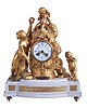 France, gilt spelter and marble figural mantel clock, "Le Triomphe de l'Amour", the stepped, white marble base with bowed front and back, supporting an attenuated, fluted column containing the clock and decorated with floral festoons and trailing ribbon, the female figure at left handing a wreath to the figure of Cupid seated atop the column, and to the right, a standing putto holding a bird, all on gilt, toupie feet, Arabic numeral white enamel dial with polychrome festoons, gilt Louis XV style hands, 8 day pendule de Paris movement