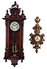 Clocks- 2 (Two) Continental wall clocks: (1) Vienna regulator, 8 day, time and strike, weight driven movement in a walnut case; (2) French cartel clock, time and strike in a brass case