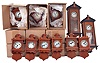 Clocks- 16 (Fifteen) miniature free swinger reproduction timepieces signed "R.K. - W.M." dated 1982; 2 (Two) Vienna reproduction regulator cases only, dated 1981; These were produced in limited numbers by William Mather in Ohio. Cherry wood cases with German movements. This recently discovered trove has the model labels on the back, but were never numbered as part of the limited edition