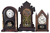 Clocks- 20 (Twenty) mantel and desk clocks: 3 (Three) black mantel clocks, 2 (Two) weight-driven ogee clocks, many wood cased mantel clocks, 2 (Two) Barr clocks for parts, a Seth Thomas chime clock, and a 400-day clock. Makers include Seth Thomas, Ansonia, Kundo, Barr, Waterbury, Ingraham, Chauncey Jerome, and H. Webster.