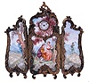Switzerland, desk or bedside clock in the form of a folding screen, gilt brass frame with foliate ornament in the rococo style, each section set with conforming polychrome painted porcelain panels depicting people in landscapes, Arabic numeral white enamel dial with blued steel hands, 30 hour, 17 jewel keywound Swiss movement with lever escapement