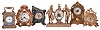 Clocks- 6 (Six): including a figural with fife and drummer, a French carriage with caryatid corners and champleve enamel dial mask, an Ansonia novelty, a British United novelty, and two other novelties with fancy cases