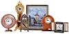 Clocks- 6 (Six): including an Ansonia miniature tall clock, a "Smiths" miniature lantern clock, a "Bayard - Luxe" travel alarm with outer case, a Bulova Swiss picture frame clock, and two others, mechanical and electric movements
