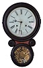 E. Ingraham & Co., Bristol, Conn., "Ionic", 8 day, time and strike spring driven movement wall clock.