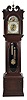 Hall clock, 8 day, time and strike on gong, two weight driven movement by Elite (Germany) in a mahogany case with reeded corner columns on trunk with brass capital flanking beveled glass door. The hood has full masculine columns and carved rosettes on broken arch top. The brass dial has silvered chapter ring, applied brass numerals and spandrels, moon phase and silvered calendar and second's bit.