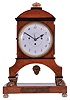 Vienna, Austria, Biedermeier mantel clock with grand sonnerie striking, fruitwood veneer case with ebonized trim and moldings, contrasting line inlay and brass mounts, resting on gilt paw feet, and supported on an oblong base with turned feet, Arabic numeral white enamel dial with date display, 60 hour, three train movement with silk thread suspension and mask pendulum
