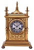 France,. for J.W. Benson, London, shelf or table clock, gilt case with Arabesque ornament, slender columns, and turned finials, Roman numeral, engine turned, silvered dial, blued steel spade hands, 8 day, time and strike pendule de Paris movement with lever platform