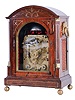 Frodsham, Gracechurch St., London, bracket clock, rosewood veneered, arch top case with brass inlay and furniture, rear door with decorative, scroll cut fret, sheet iron dial plate, well finished 8 day, two train movement, striking the hours in passing, and repeating on demand