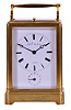 D.F. Aubert, a Geneve, grand sonnerie striking carriage clock with alarm and repeat, gilt one piece case with beveled glasses, Roman numeral white enamel dial, blued steel Breguet style hands, 8 day movement with lever platform, striking grand or petite sonnerie quarters in passing, and repeating on demand