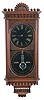 Reproduction Ithaca Calendar Clock Co., "Hanging Kildare" wall clock, 8 day, time and strike, spring driven movement with perpetual calendar, in a walnut case with black papered dials and cut crystal pendulum