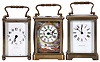 Clocks- 3 (Three) Carriage: All French, all with brass cases, white enamel dials, 8 day, timepiece movements, two with cylinder escapements, one with lever escapement, one with later polychrome enamel panels