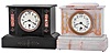 Clocks- 2 (Two) Boston Clock Co., Boston, Mass. mantel: (1) 8 day, time and strike, tandem wind balance wheel rack strike movement in black slate case with red marble insets and incised gold accents, c1890; (2) 8 day, time and strike, tandem wind balance wheel rack strike movement in white onyx case with applied metal accents and fancy dial, c1890.