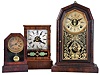 Clocks- 3 (Three): (1) E. N. Welch Mfg. Co., Forestville, Conn., "Empress V.P." shelf clock with a spring driven, 8 day, time and strike movement in a rosewood veneered case, c1880; (2) Unidentified American Cottage clock, probably Waterbury, with a spring driven 30 hour time and alarm movement in a rosewood veneered case, c1870; (3) The Terry Clock Co., Waterbury, Conn., Cottage clock with a spring driven 30 hour timepiece movement in a mahogany veneered case, c1870.