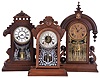Clocks- 3 (Three): (1) William L. Gilbert Clock Co., Winsted, Conn., "Lebanon" shelf clock with a spring driven, 8 day, time and strike movement in a walnut case, c1885; (2) Ansonia Clock Co., New York, NY, "Parisian" shelf clock with a spring driven, 8 day time and half hour strike movement in a black walnut case, c1880; (3) William L. Gilbert Clock Co., Winsted, Conn., unidentified shelf model with a spring driven, 8 day, time and strike movement with a simple calendar mechanism in a walnut case, c1885.