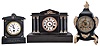 Clocks- 3 (Three) Black Mantel: (1) French, mantel clock, time only, spring driven movement in a black slate case with gray marble insets, c1880; (2) Ansonia Clock Co., NY, "Boston Extra" mantel clock, 8 day time and strike, spring driven movement in a black enameled iron case with applied gilt ornaments and fancy dial, c1904; (3) Ansonia Clock Co., NY, "Calais" mantel clock, 8 day time and strike, spring driven movement in a black enameled iron case with applied gilt trimmings and verde bronze fluted columns, c1904.