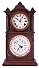 E. Ingraham & Co., Bristol, Conn., "Ingraham Calendar" double dial parlor clock, 8 day, time and strike, spring driven movement with B. B. Lewis's patented perpetual calendar mechanism in a walnut case, c1881.