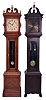 Tall Clocks- 3 (Three) American: (1) Ithaca Clock Co., 8 day, spring driven, time and strike on a gong in an oak case; (2) New Haven Clock Co. (attribution), 8 day, weight driven, time and strike in a mahogany case; (3) Colonial Clock Co., Zeeland, Michigan, "Model No. 1340", 8 day, weight driven, time and strike floor clock with Winterhalder movement in a mahogany case, c1920.