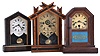 Clocks- 7 (Seven): (1) Ansonia Clock Co., New York, unidentified cottage shelf clock with a spring driven 30 hour timepiece movement in a wood case, c1890; (2) E. Ingraham & Co., Bristol, Conn., "OK" shelf clock with a spring driven 30 hour time and alarm movement in a light wood case, c1884; (3) Jerome and Co., New Haven, Conn., unidentified cottage shelf clock with a spring driven 30 hour movement in a rosewood veneered case, c1870; (4) Jerome & Co., New Haven, Conn., "Rose Cottage" shelf clock with a spring driven 30 hour time and alarm movement in a rosewood veneered case, c1870; (5) Seth Thomas Clock Co., Thomaston, Conn., cottage shelf clock with a spring driven 30 hour movement in a rosewood and mahogany veneered case, c1875; (6) Badenia Clock Manufactory, Bavaria, Germany cottage shelf clock with a spring driven 30 hour time and alarm movement in a grained wooden case, c1870; (7) Seth Thomas Clock Co., Plymouth Hollow, Conn. cottage shelf clock with a spring driven time and alarm movement in a rosewood veneered case, c1860.