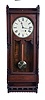 Seth Thomas Clock Co., Thomaston, Conn., "Queen Anne" hanging clock with a spring driven, 8 day timepiece movement in a walnut case.