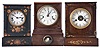 Clocks- 3 (Three): (1) Chauncey Jerome, New Haven, Conn., 30 hour, time, strike and alarm spring driven movement cottage clock, c1850; (2) Unknown, probably Chauncey Jerome, New Haven, Conn., 30 hour, time and strike spring driven movement cottage clock, c1850; (3) Unknown, possibly C. Jerome or J. C. Brown, 30 hour, time and strike spring driven movement cottage clock, c1850.