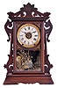 Seth Thomas Clock Co., Thomaston, Conn., "Newark" shelf clock with a spring driven, 8 day time, strike and alarm movement with a patent (British) Winward's Alarm mechanism in a walnut case.