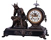 Ansonia Clock Co., New York, NY, "Mercury" figure shelf clock with a spring driven, 8 day time and half hour strike movement in a japanese bronzed metal case.