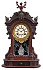 Ansonia Clock Co., New York, NY, "Monarch" shelf clock with a spring driven, 8 day time and half hour strike movement in a black walnut case.