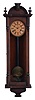 Ansonia Clock Co., New York, NY, "Capitol" wall hanging clock with a spring driven, 8 day timepiece movement in an oak case.