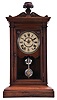 Seth Thomas Clock Co., Thomaston, Conn., "Greek" shelf clock with a spring driven, 8 day, time and strike, lyre movement in a walnut case.