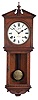 Seth Thomas Clock Co., Thomaston, Conn., "Umbria" hanging clock with a spring driven, 8 day, time and strike, (cathedral gong) movement in an oak case.