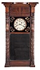 Munger & Benedict, Auburn, New York, 8 day, time and strike, weight driven brass movement ironing board top wall clock.