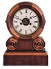 E. Ingraham & Co., Bristol, Conn., "Grecian Mosaic" shelf clock with a spring driven 30 hour time, strike and alarm movement in a walnut and maple case.