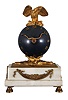 French mantel clock, 8 day, time only spring driven movement balance wheel movement on a white marble base with gilt metal ornaments, patinated spherical body with applied roman numerals, hands in the form of a snake, surmounted by a gilt cast metal eagle with outstretched wings. Diminutive round movement is stamped "FRENCH MAKE".