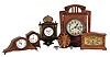 Clocks- 6 (Six) French and German Desk and Wall: (1) France, mantel clock, 8 day time only platform movement in a red wood case with Asian inspired design; (2) Hamburg American Clock Co., Germany, wall clock, 8 day, time and strike, spring driven clock in a oak case with silvered metal dial; (3) France, desk clock, 8 day, time only with a cylinder escapement in a walnut and mahogany veneered case with white paper dial; (4) Germany, desk clock, 8 day, time only in an inlaid mahogany case with white enamel dial; (5) France, "Montana" desk clock, 8 day, time only balance wheel movement in a Mid-Century Modern figured veneer case; (6) Germany, wall clock, 30 hour time only, spring driven in a dark wood case with metal columns and spandrels with a white enamel dial featuring a star of David and numerals in Hebrew.