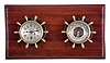 Chelsea Clock Co., Boston, Mass., "Manhattan" clock and barometer set, patinated bronze cases with mounting flanges, 2 3/4"" dials, blued steel hands, 8 day timepiece movement with lever escapement, and holosteric barometer with thermometer, serial #277463, now mounted to a wooden board for hanging