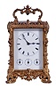 Dent, Paris, a very decorative repeating carriage clock with simple calendar and alarm, the cast, gilt case on hybrid paw feet with acanthus and scroll ornament, base with male mask above a foliate festoon, the top corners with acanthus ornamented masks and foliate pendants, and the top bordered with bead and leaf decorated moldings below an openwork, reinceaux fret, Roman numeral white enamel dial with subsidiary displays for alarm, day, and date, blued steel trefoil hands, 8 day, time and strike movement with lever platform, striking the hour and half hour in passing, and repeating the last hour on demand