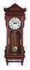 Waterbury Clock Co., Waterbury, Conn., "Regulator No. 57" hanging clock with a double weight driven 8 day timepiece movement in a mahogany case.